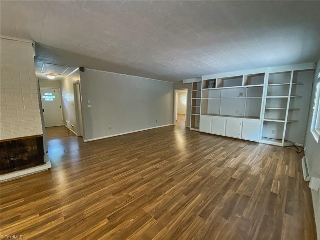 2303 Gordon Road High Point, NC 27265 - Photo 5 of 29 Laminate Flooring Throughout