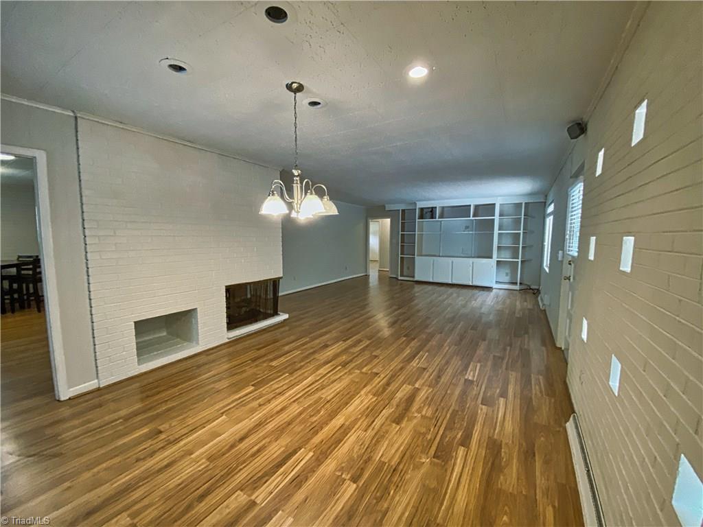 2303 Gordon Road High Point, NC 27265 - Photo 7 of 29 Dining Room - Den with Fireplace