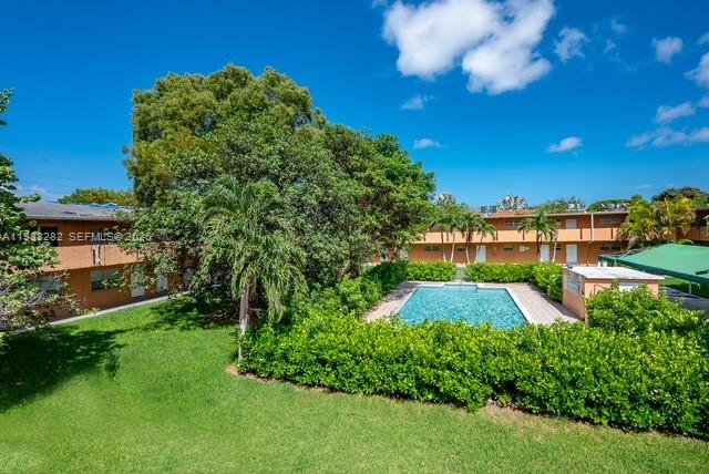 9760 Southwest 184th Street, Unit 6D Cutler Bay, FL 33157 - Photo 15 of 16 a view of yard with green space