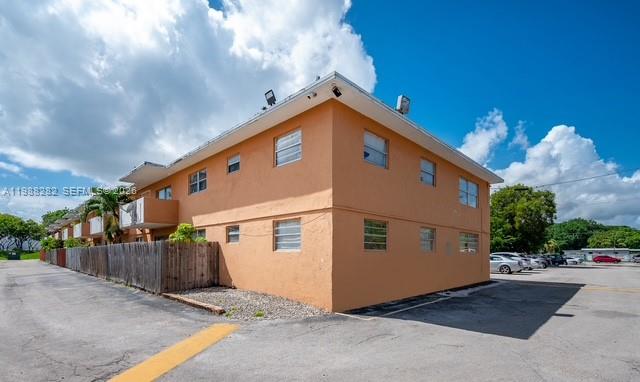9760 Southwest 184th Street, Unit 6D Cutler Bay, FL 33157 - Photo 16 of 16 a view of a house with a yard