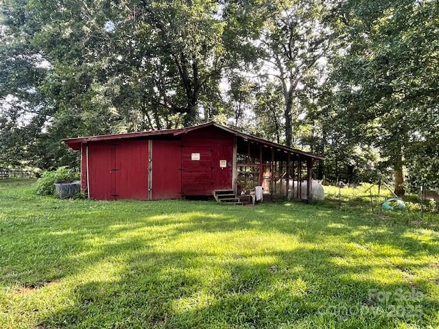 126 Waters Road Bostic, NC 28018 - Photo 2 of 29 a fire hydrant in the middle of a field