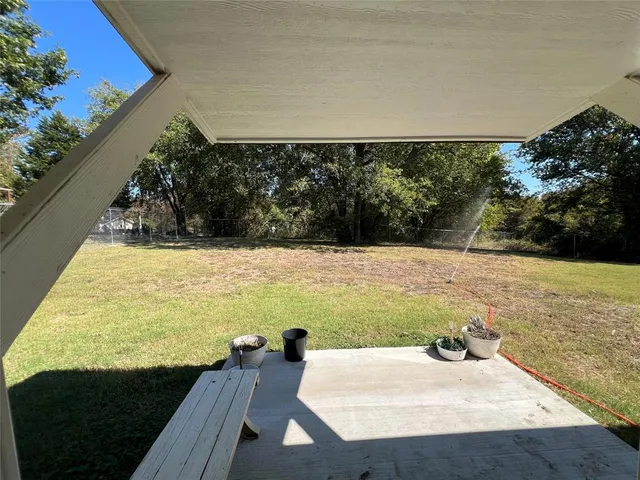 a view of swimming pool with seating space