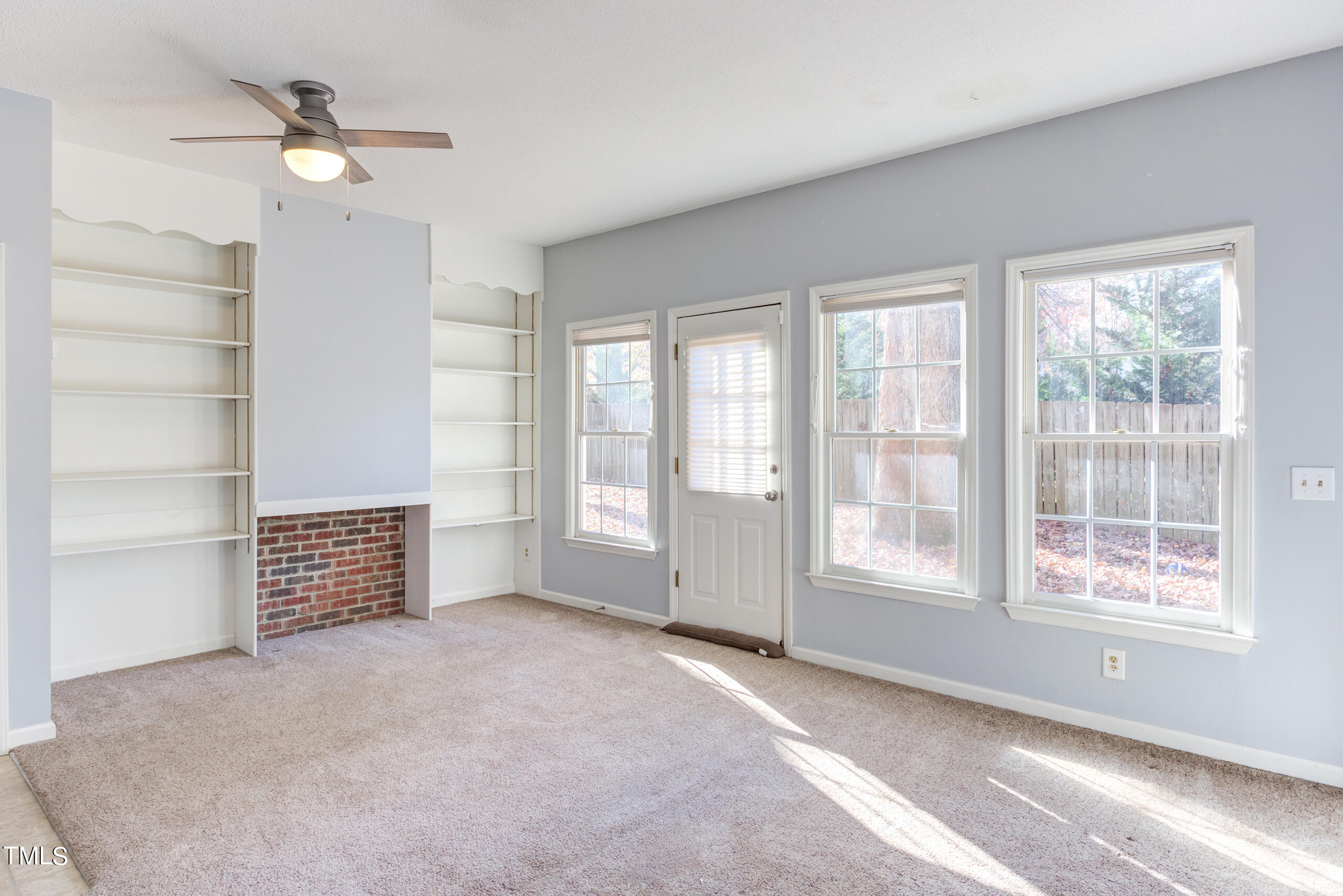 2800 Polesdon Court Raleigh, NC 27615 - Photo 17 of 21 Versatile bonus room could be a movie room, playroom or maybe an office. The built-ins are perfect for collectibles or books.