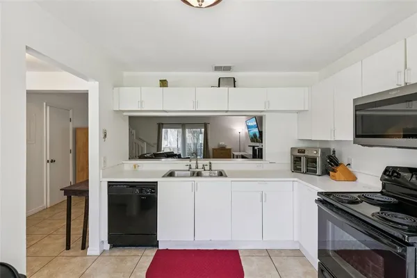 $215,000 | 5989 Braemar Place, Unit 102, Orlando, FL 32822
