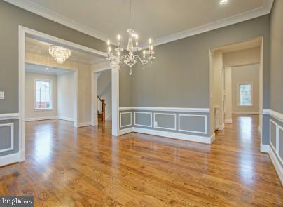2025 Kilgore Road Falls Church, VA 22043 - Photo 12 of 33 Dining room has extensive molding s & a chandelier