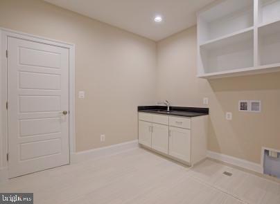 2025 Kilgore Road Falls Church, VA 22043 - Photo 22 of 33 Upper level laundry room