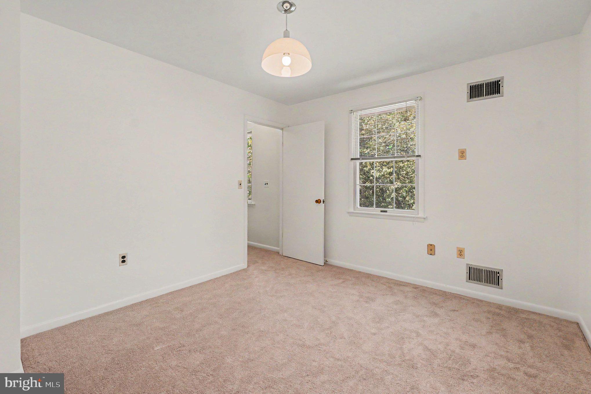 9204 Snyder Lane Perry Hall, MD 21128 - Photo 20 of 42 a view of an empty room with a window