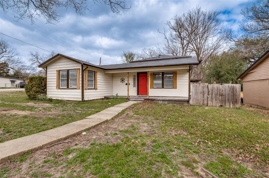 421 West 8th Street Lancaster, TX 75146 - Photo 2 of 28 Single-story residence featuring light-colored siding and a contrasting dark roof
