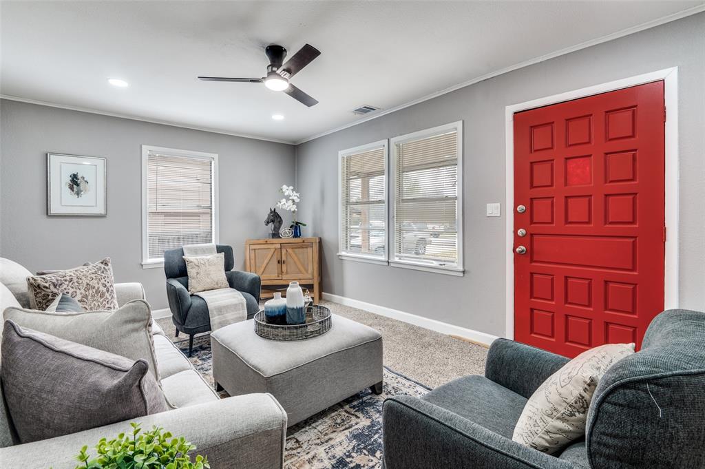 421 West 8th Street Lancaster, TX 75146 - Photo 3 of 28 Living area featuring a red paneled entry door, recessed lighting, ceiling fan, and multiple windows with blinds