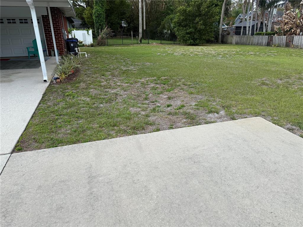 1322 Riverside Drive Titusville, FL 32780 - Photo 20 of 21 a view of a backyard with green space