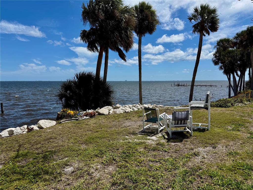 1322 Riverside Drive Titusville, FL 32780 - Photo 3 of 21 a view of a terrace with chairs