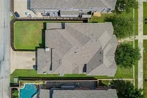 an aerial view of a highlighted house