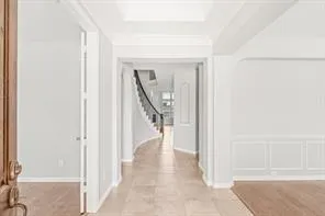 a view of a hallway with staircase