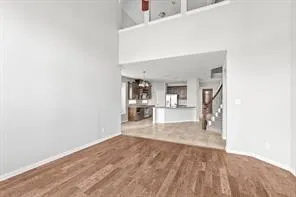 a view of a kitchen from the hallway