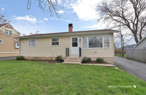 a front view of house with yard