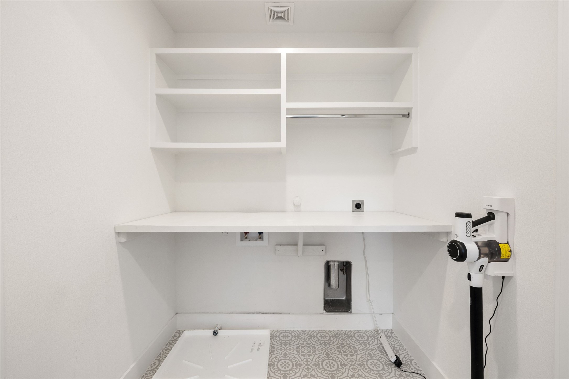 5601 Jackie Robinson Street, Unit 1 Austin, TX 78721 - Photo 30 of 40 Spacious walk in laundry room upstairs that offers additional storage.