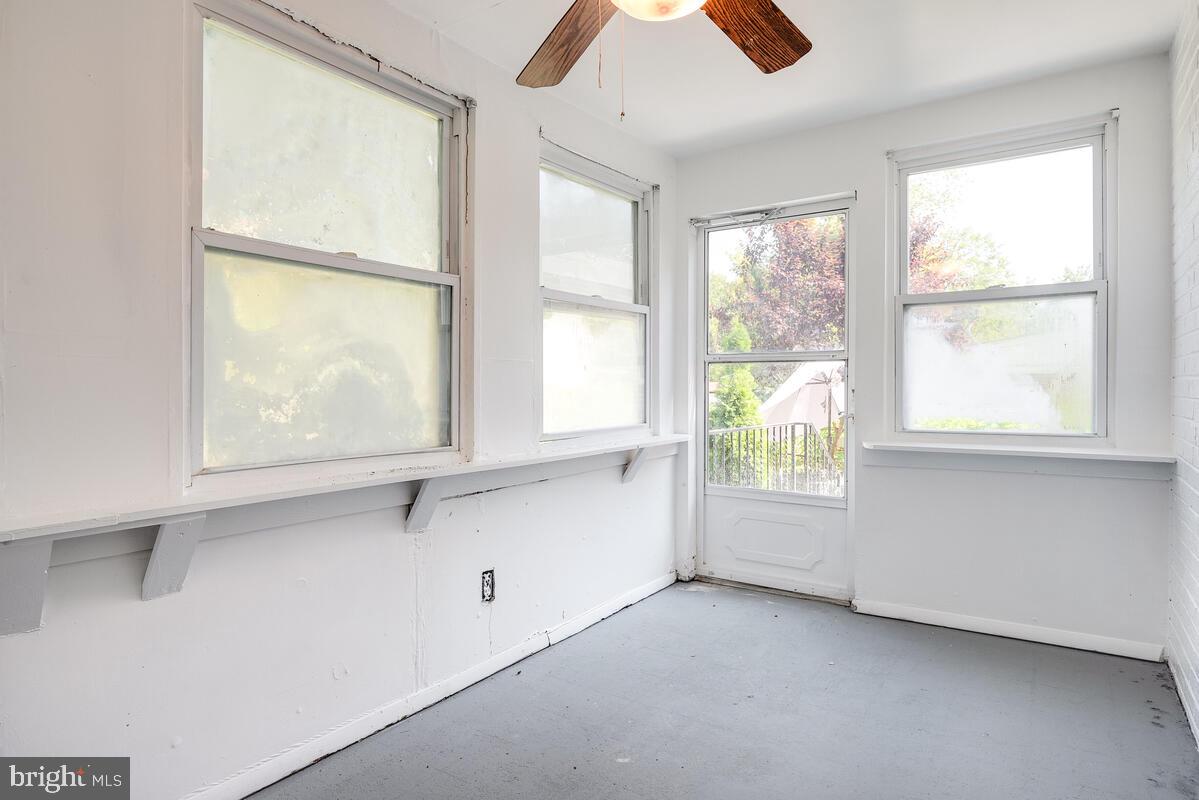 904 Newhall Street Silver Spring, MD 20901 - Photo 22 of 47 Enclosed Back Porch w/Exit to Patio & Backyard