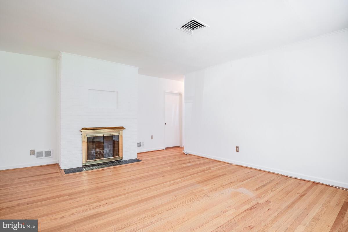 904 Newhall Street Silver Spring, MD 20901 - Photo 8 of 47 Living Room w/Brick Fireplace
