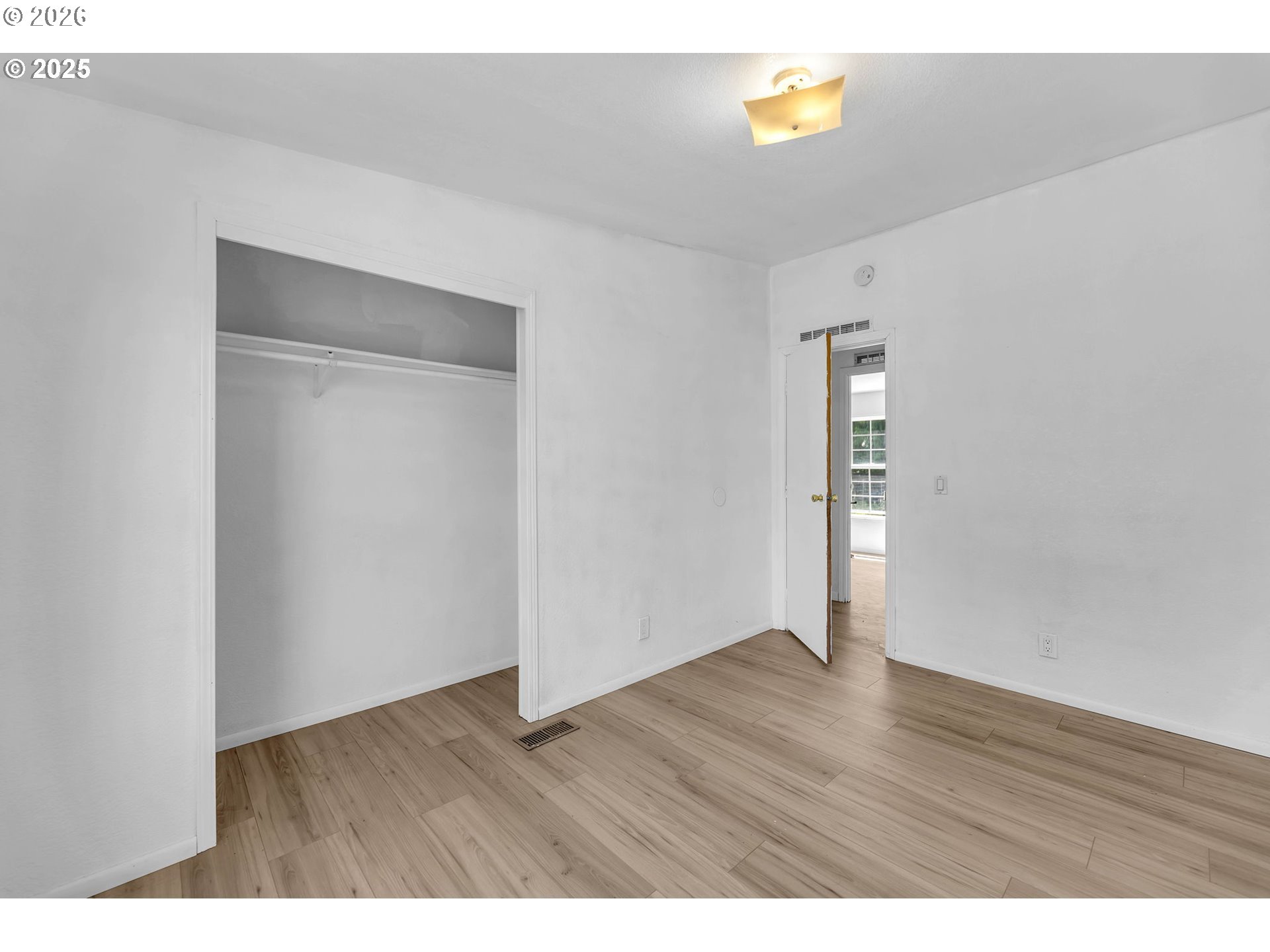 241 Foster Creek Road Toledo, WA 98591 - Photo 17 of 17 a view of an empty room with wooden floor and a window