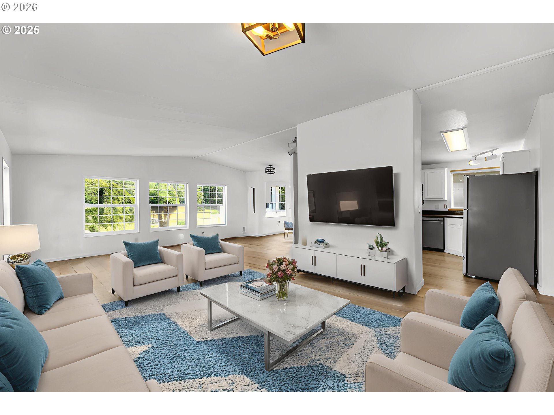 241 Foster Creek Road Toledo, WA 98591 - Photo 7 of 17 a living room with furniture and a flat screen tv