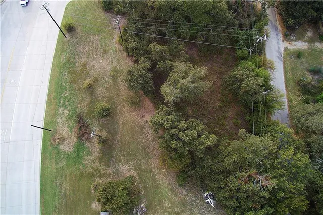 an aerial view of residential house with outdoor space