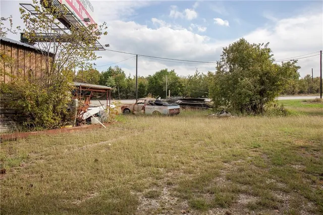 a fire hydrant in the middle of a field