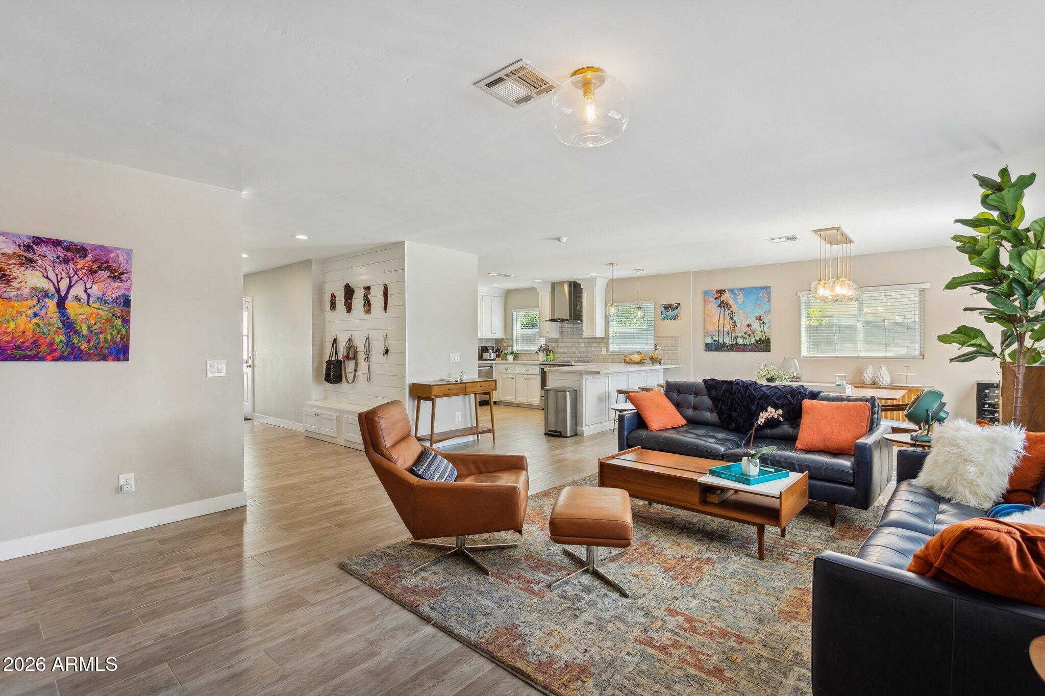 322 West Coronado Road Phoenix, AZ 85003 - Photo 8 of 75 a living room with furniture and a wooden floor