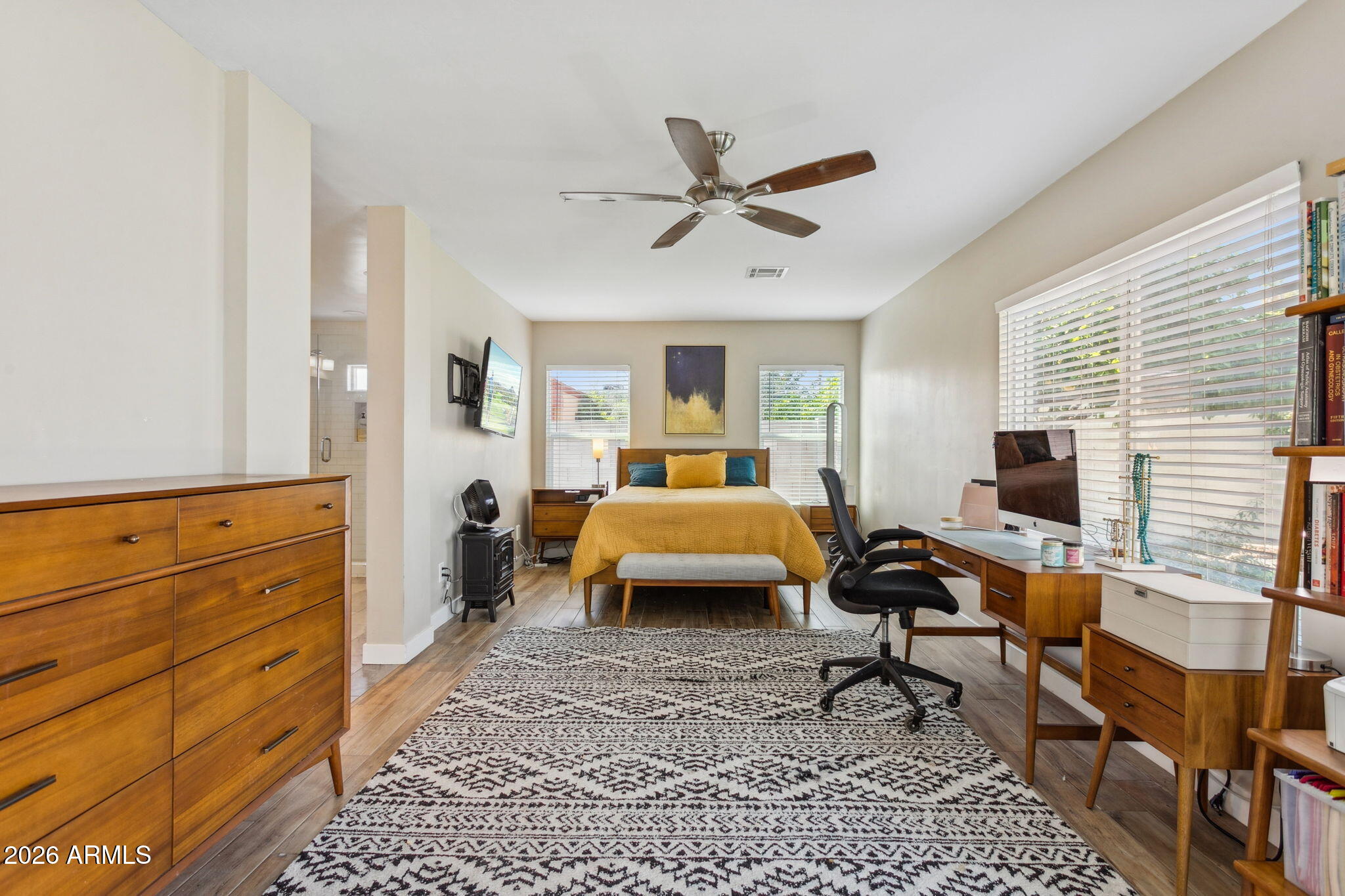 322 West Coronado Road Phoenix, AZ 85003 - Photo 11 of 75 a bedroom with a bed and a chandelier