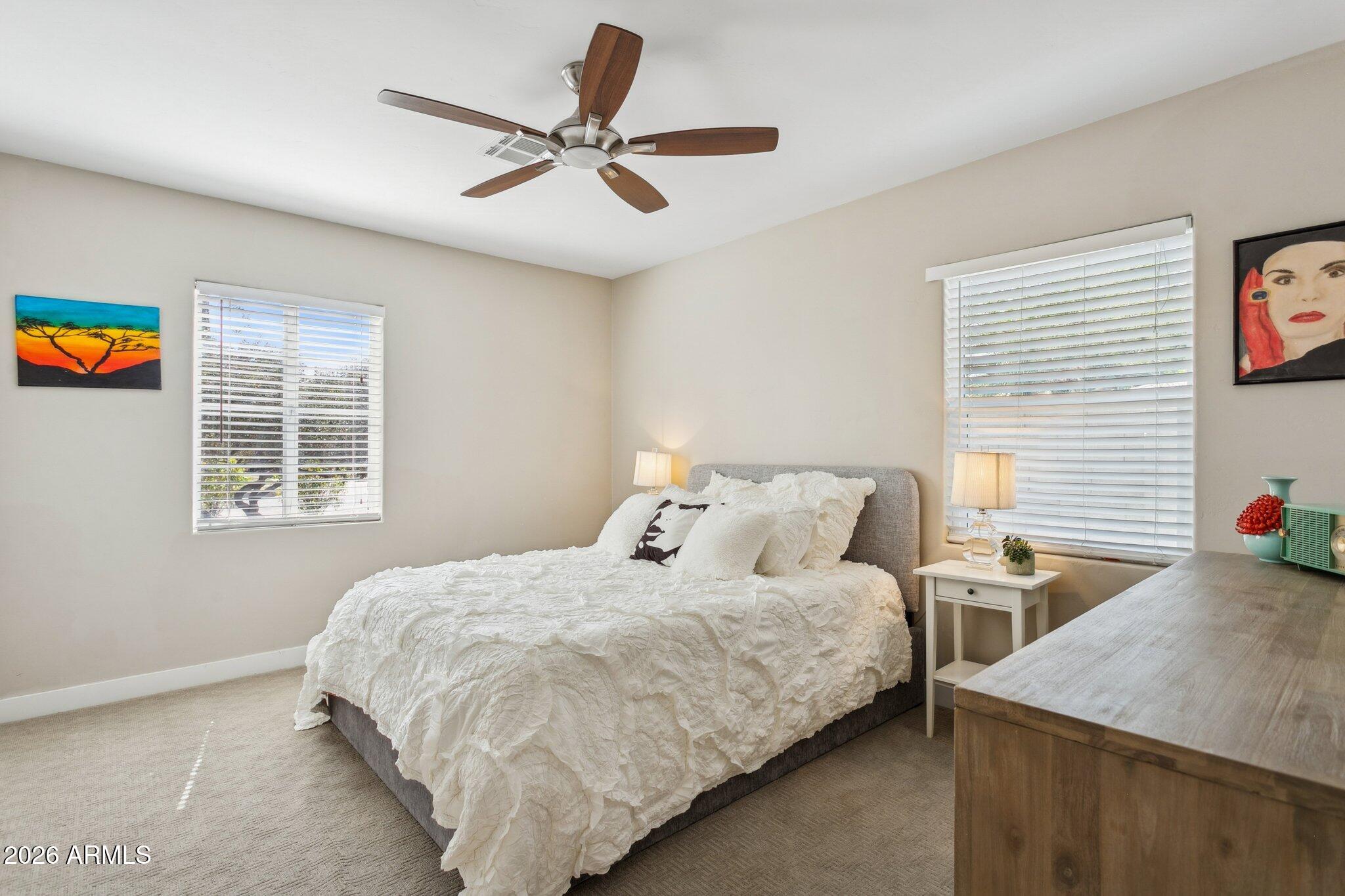 322 West Coronado Road Phoenix, AZ 85003 - Photo 13 of 75 a bedroom with two beds and a window