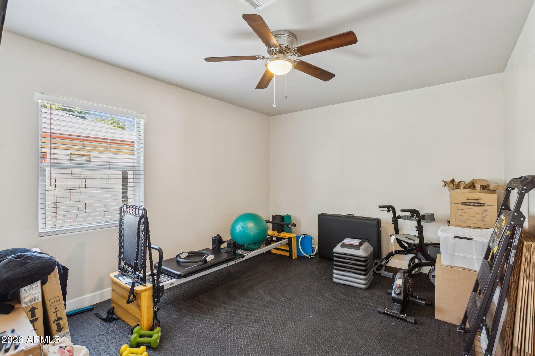322 West Coronado Road Phoenix, AZ 85003 - Photo 14 of 75 a room with gym equipment