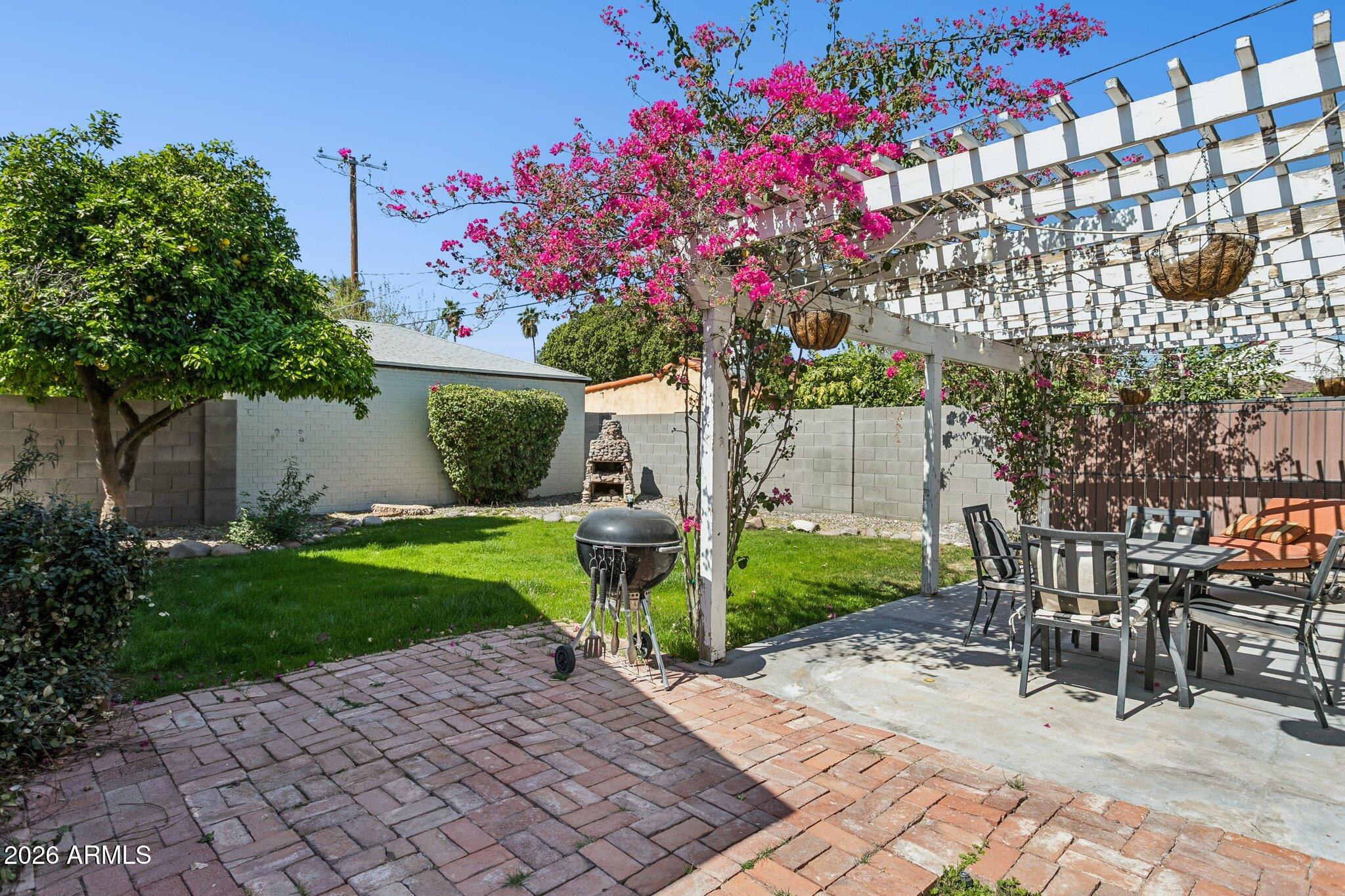322 West Coronado Road Phoenix, AZ 85003 - Photo 21 of 75 a front view of a house with garden