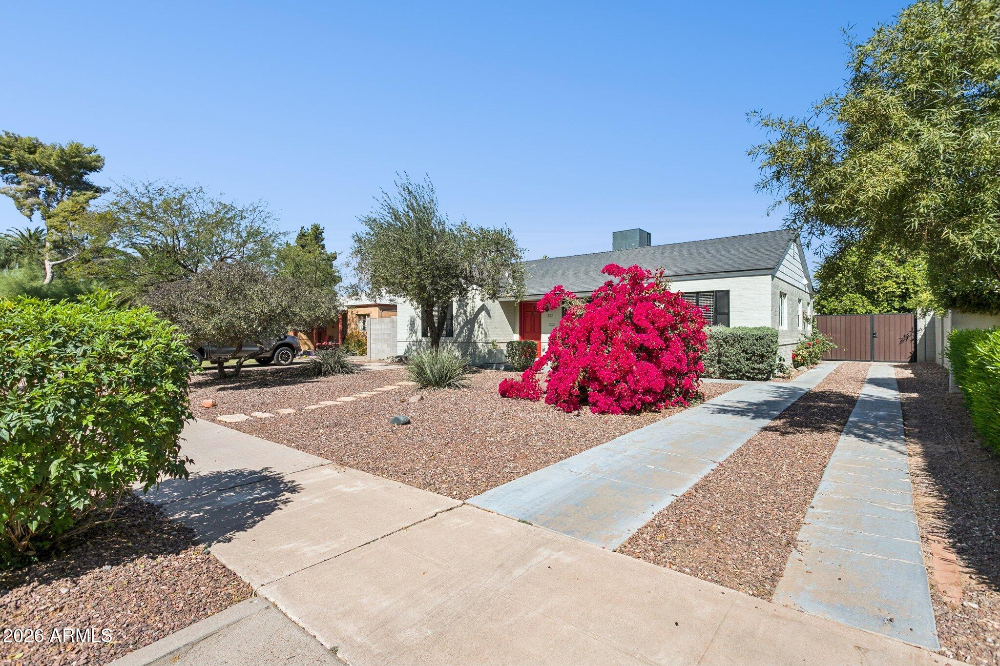 322 West Coronado Road Phoenix, AZ 85003 - Photo 28 of 75 a front view of a house with a yard