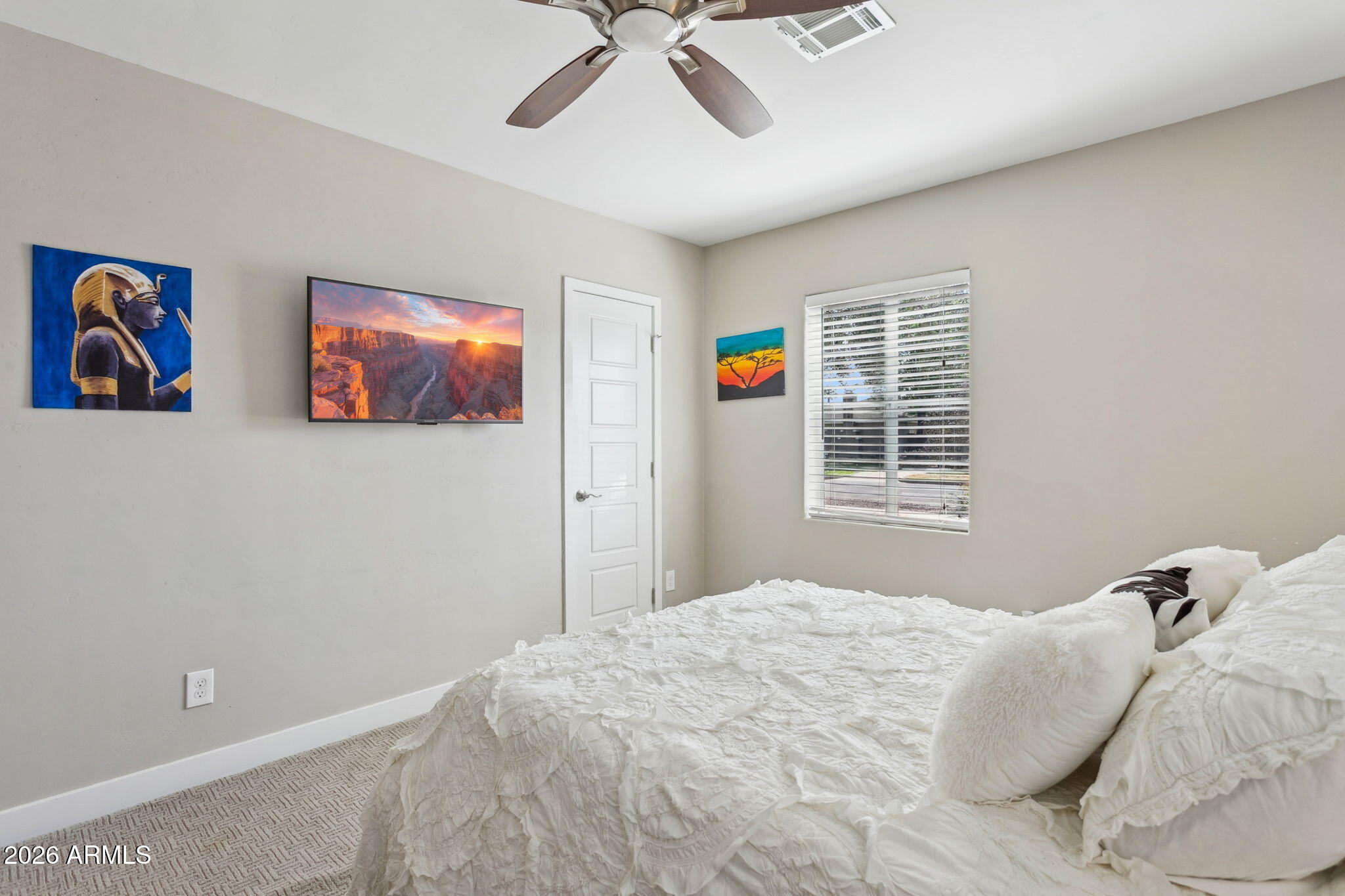 322 West Coronado Road Phoenix, AZ 85003 - Photo 46 of 75 a bedroom with a bed and a window