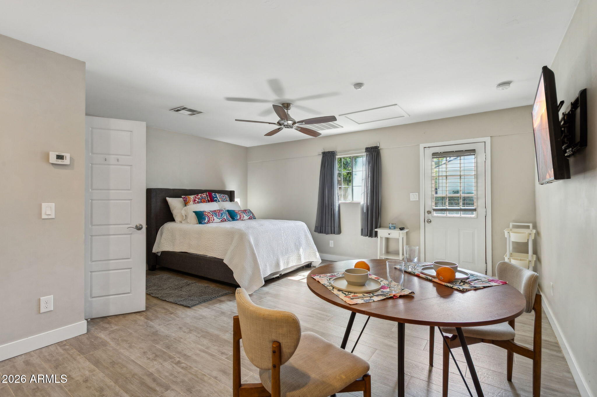 322 West Coronado Road Phoenix, AZ 85003 - Photo 50 of 75 a bedroom with a bed and a table in it