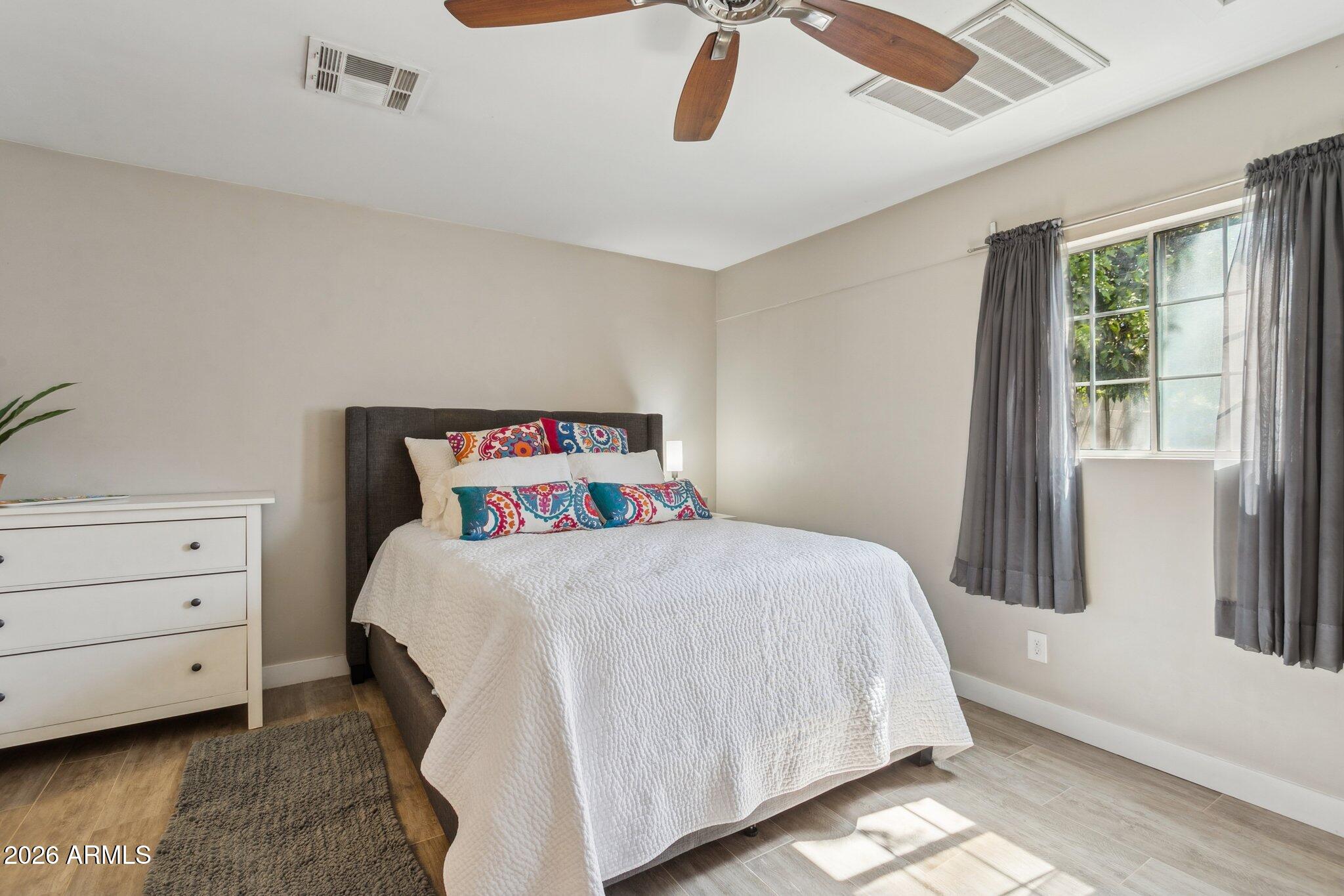 322 West Coronado Road Phoenix, AZ 85003 - Photo 54 of 75 a bedroom with a bed and a window