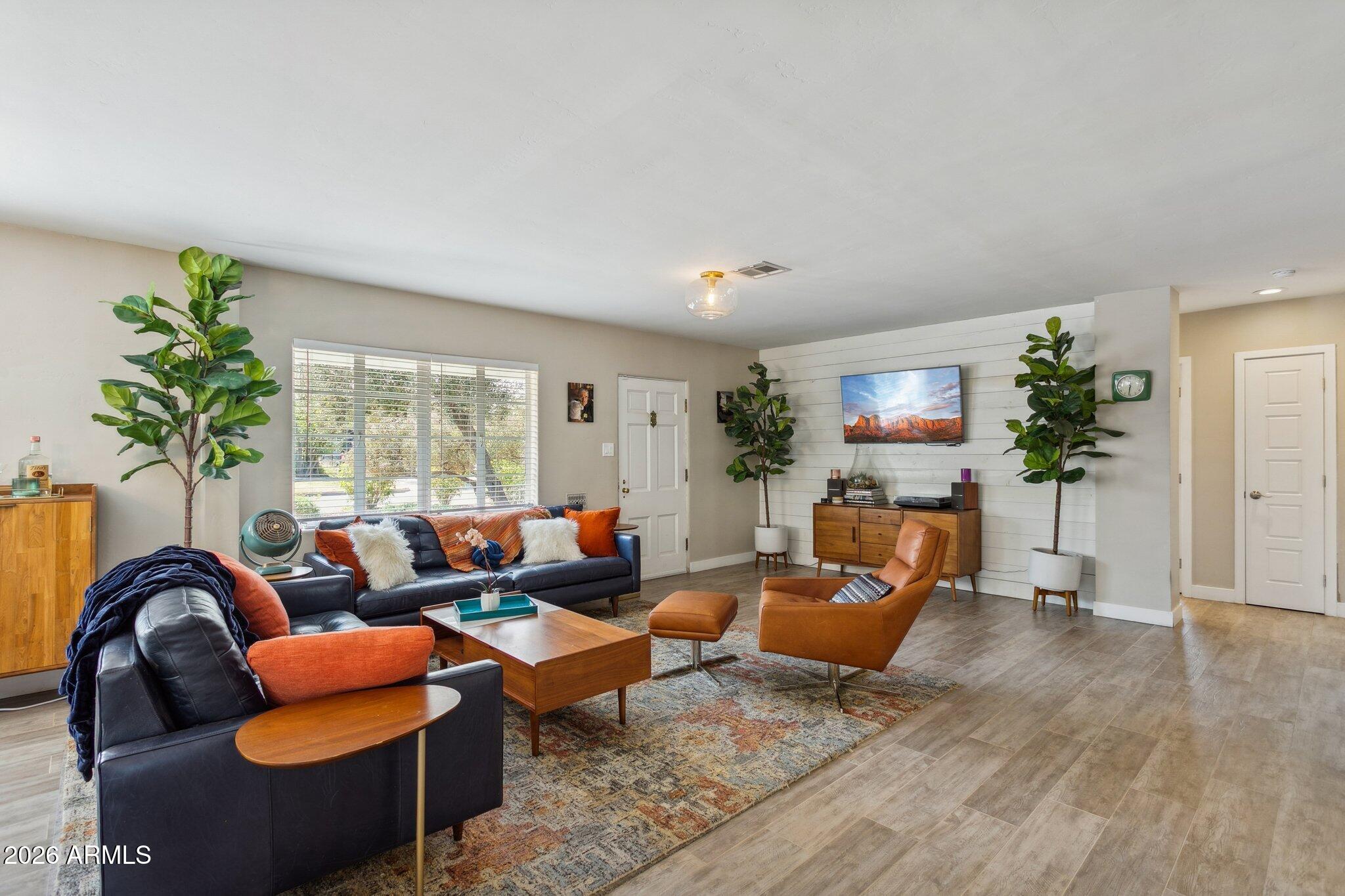322 West Coronado Road Phoenix, AZ 85003 - Photo 4 of 75 a living room with furniture and a potted plant