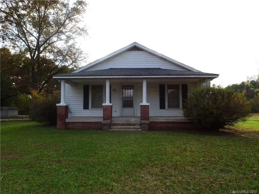 385 Shue Road China Grove, NC 28023 - Photo 1 of 11 a front view of a house with garden