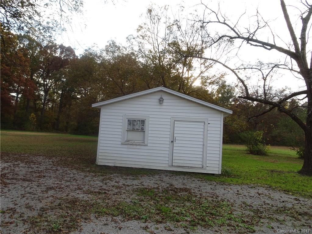 385 Shue Road China Grove, NC 28023 - Photo 11 of 11 a view of a house with a yard