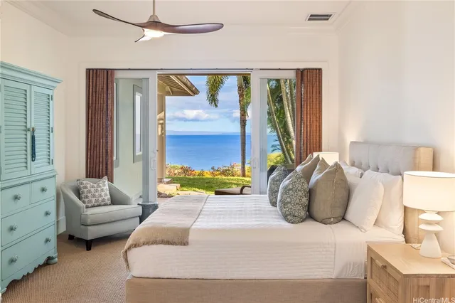 a bedroom with a bed and a couch