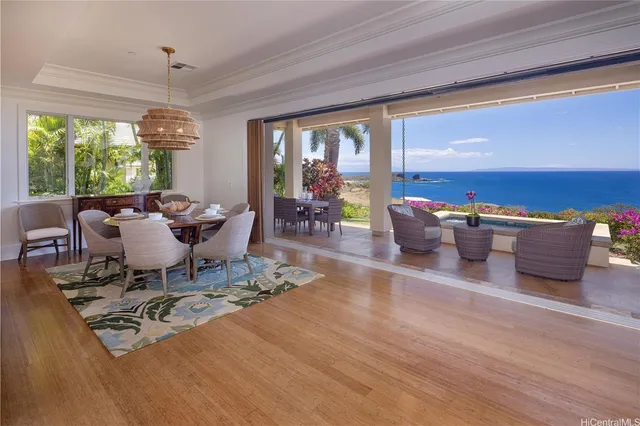 a living room with furniture a window and a table