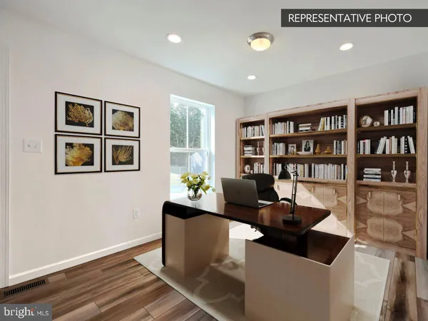 a view of a workspace with furniture