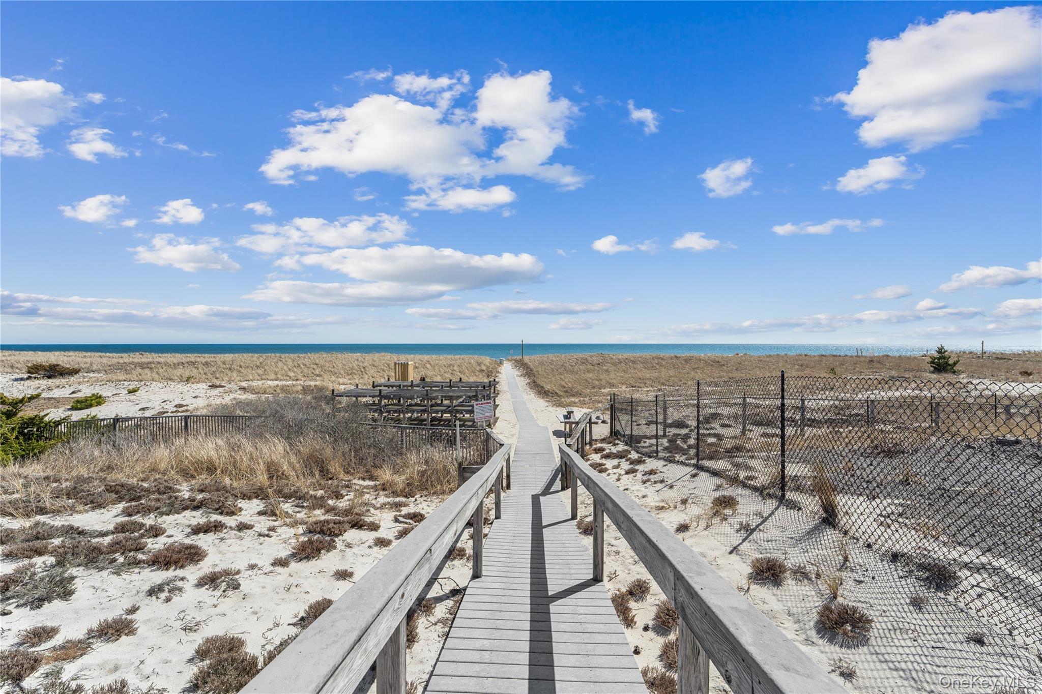 253 Dune Road, Unit 48 Westhampton Beach, NY 11978 - Photo 28 of 28 a view of a terrace