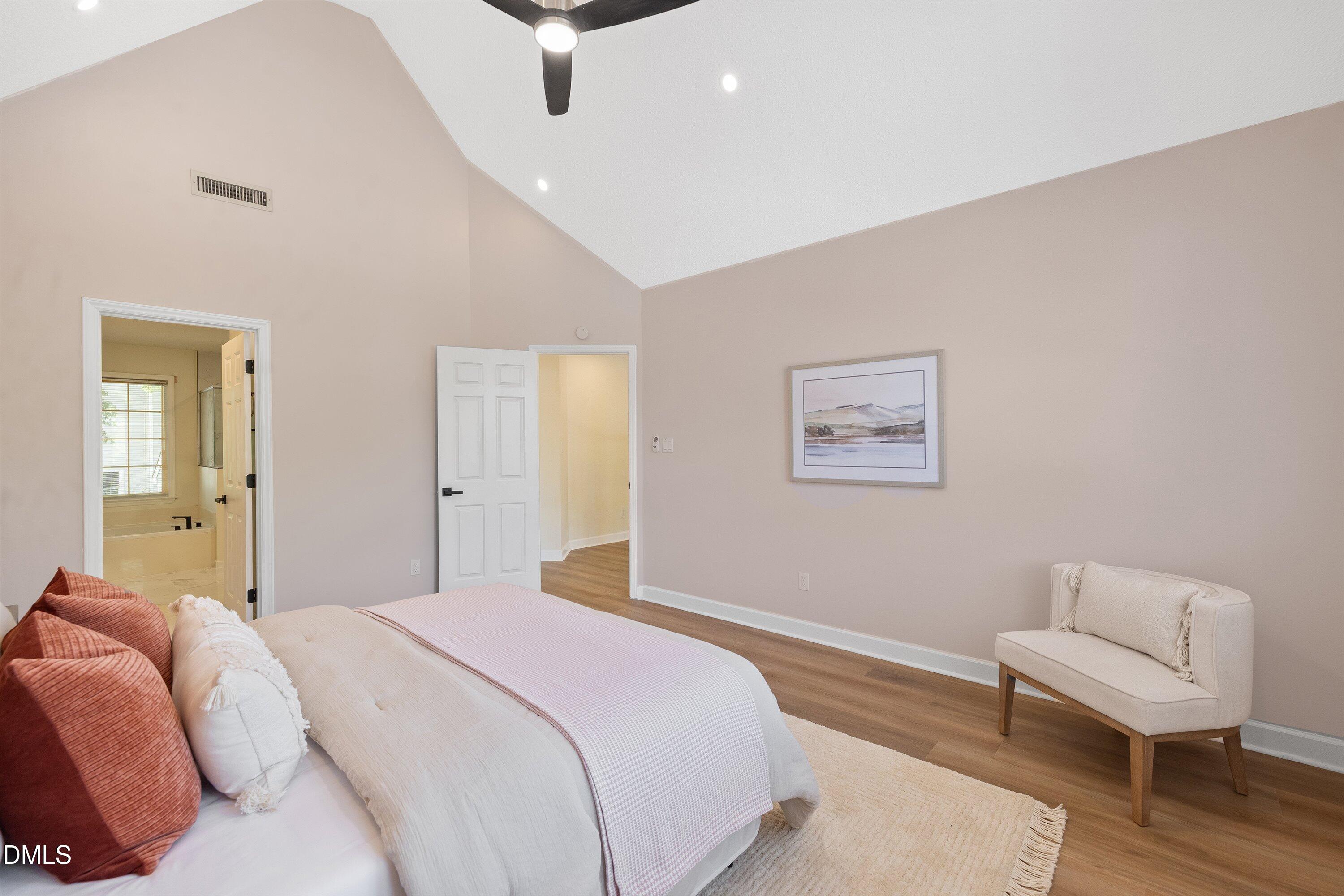 2517 Birchford Court Raleigh, NC 27604 - Photo 36 of 63 a bedroom with a bed and a couch