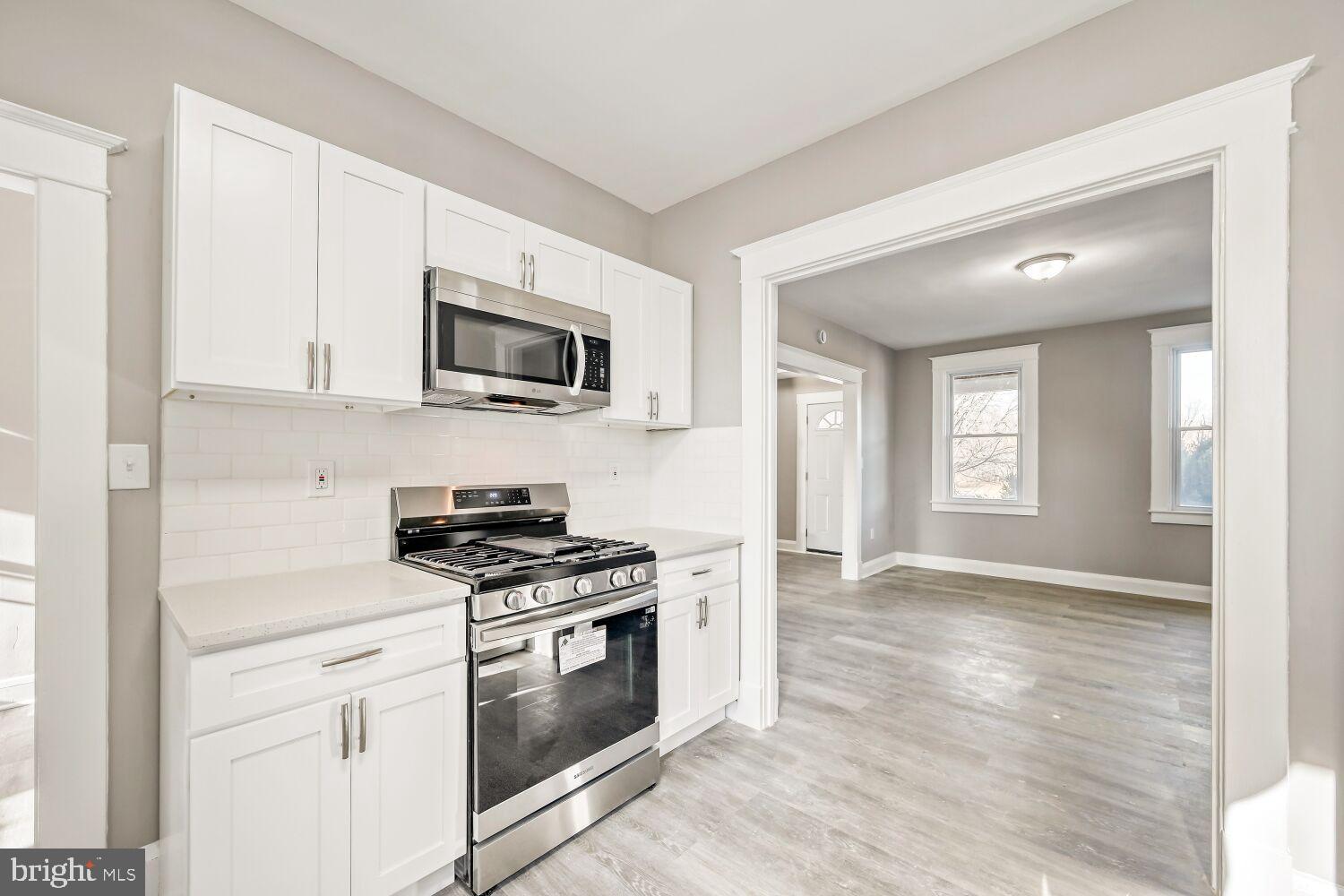 2647 Chesterfield Avenue Baltimore, MD 21213 - Photo 11 of 28 Modern kitchen with open living space.