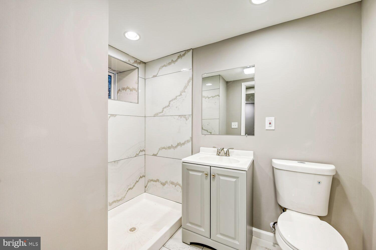 2647 Chesterfield Avenue Baltimore, MD 21213 - Photo 20 of 28 Modern bathroom with elegant marble accents.