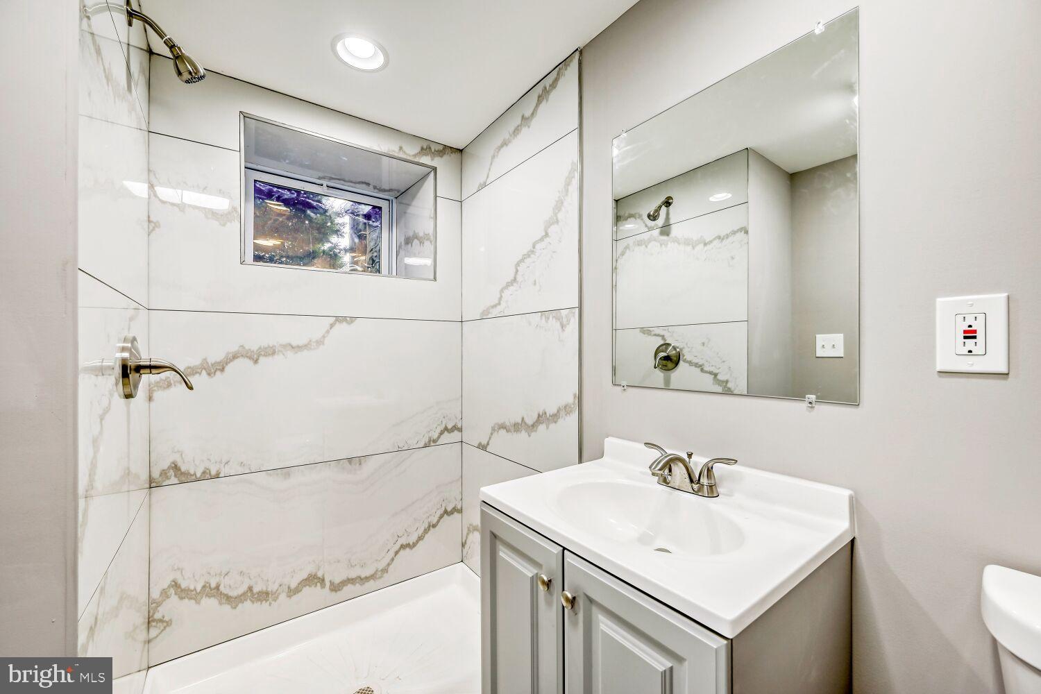 2647 Chesterfield Avenue Baltimore, MD 21213 - Photo 21 of 28 Sleek modern bathroom with elegant finishes.