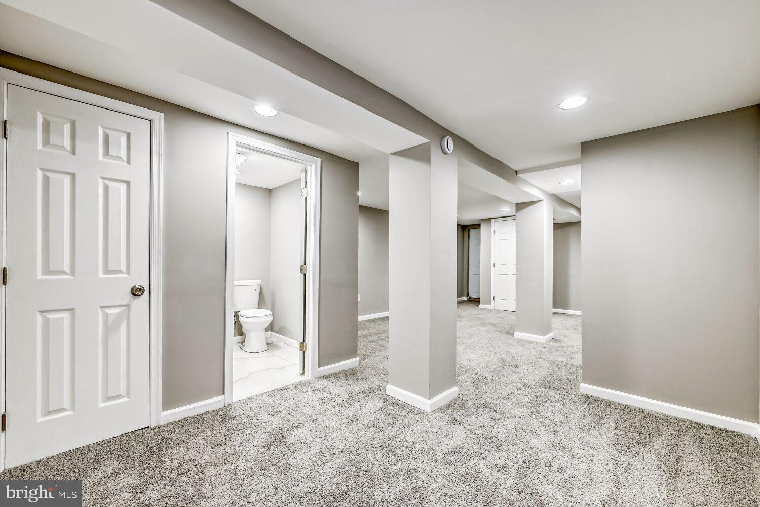 2647 Chesterfield Avenue Baltimore, MD 21213 - Photo 24 of 28 Spacious, versatile basement with modern finishes.