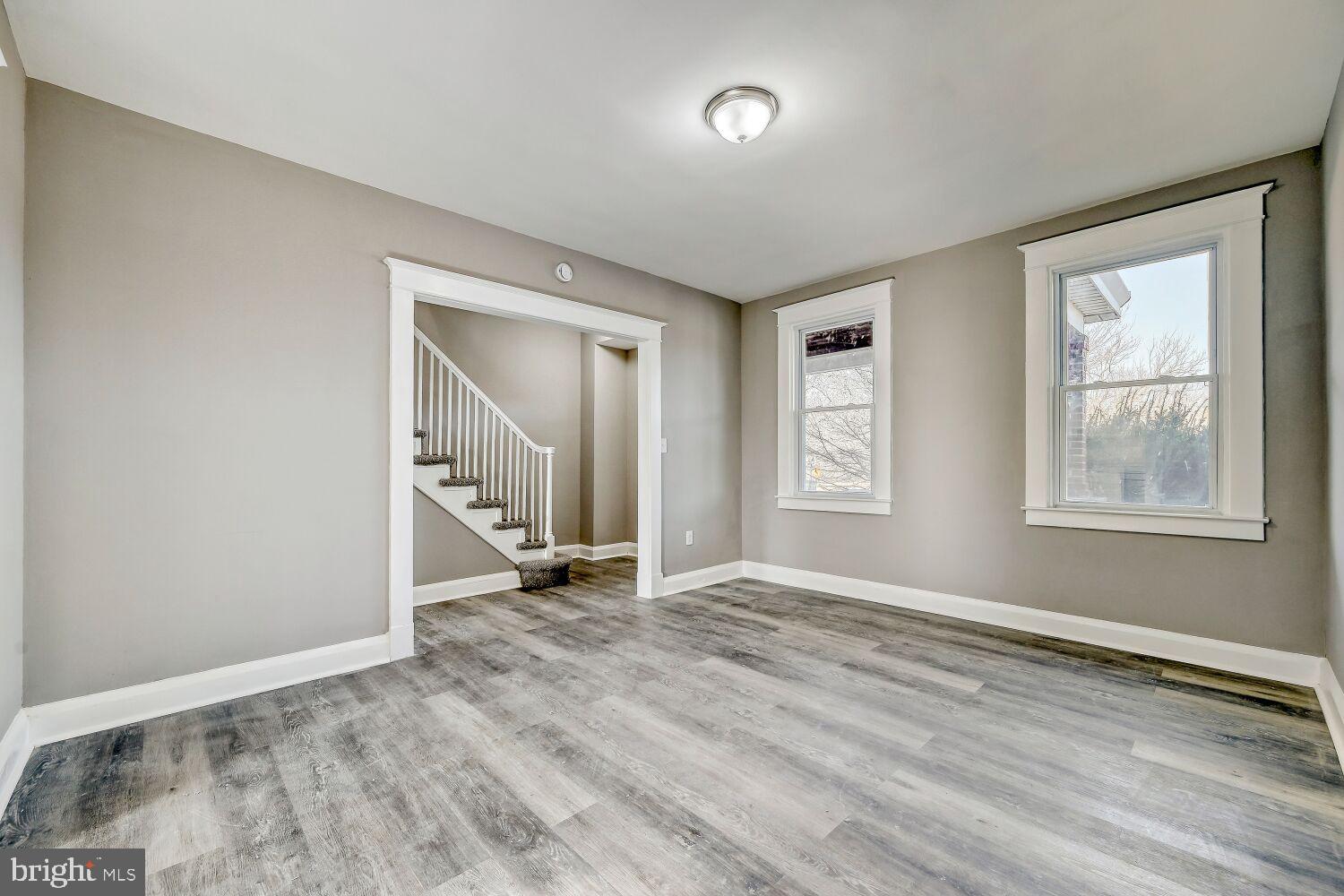 2647 Chesterfield Avenue Baltimore, MD 21213 - Photo 4 of 28 Bright and airy space with elegant staircase.