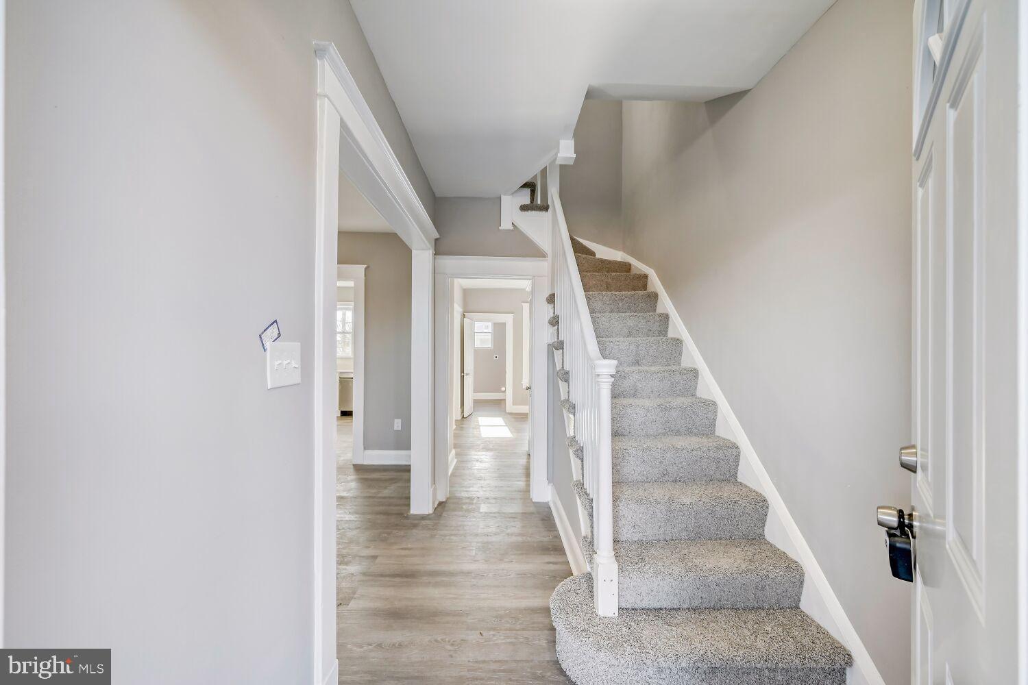 2647 Chesterfield Avenue Baltimore, MD 21213 - Photo 5 of 28 Inviting entryway with elegant staircase.