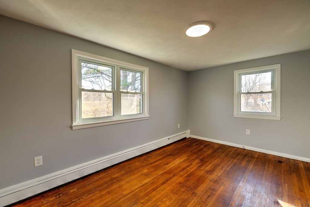 138 Coy Hill Road Warren, MA 01083 - Photo 19 of 42 a view of a room with wooden floor and fan